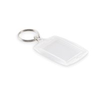 Klasisks akrila atslēgu piekariņš ar papīra ieliktni. Iekšējie izmēri – 4,1 × 2,7 cm. (200-16758)